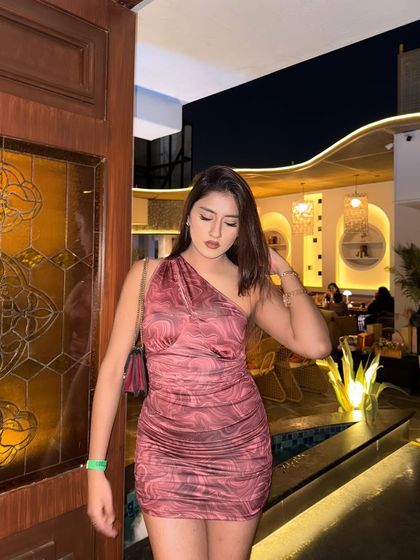 "The heart wants what it wants." A one-shoulder, printed mini dress for a night out.