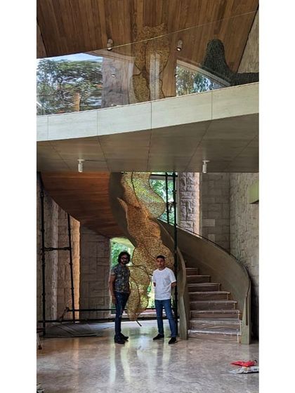 Standing with the client next to the completed installation in their Pune home. Collaboration is key to site-specific work, and this piece was developed through a dialogue to ensure it perfectly matched their vision and space.