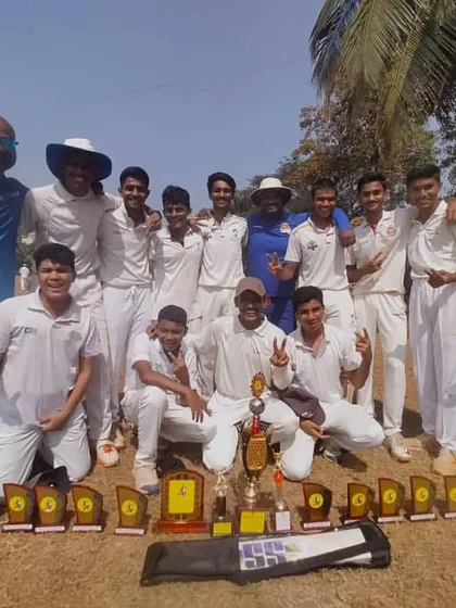 The whole team with their collection of trophies after a flawless tournament victory. This picture represents countless hours of practice and dedication.