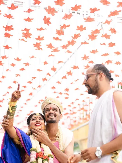 A beautiful moment from a Kannada wedding where the couple looks up towards their future together. I aim to capture these symbolic details that make each wedding unique.