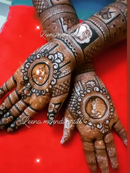 A close-up of the bride and groom portraits within a circular frame. This style allows the faces to be the central focus, surrounded by intricate patterns.