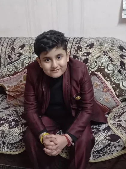 A smart and confident look from a 9-year-old contestant.