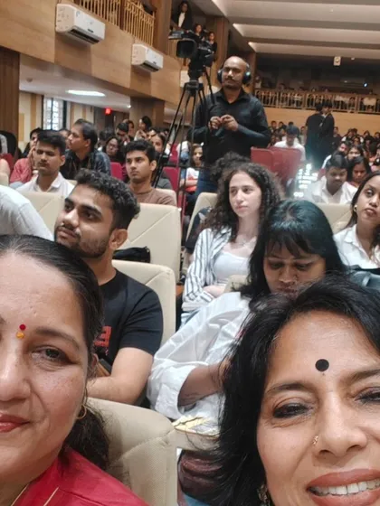 A selfie from the audience at the GLC event, capturing the engaged atmosphere of the auditorium.
