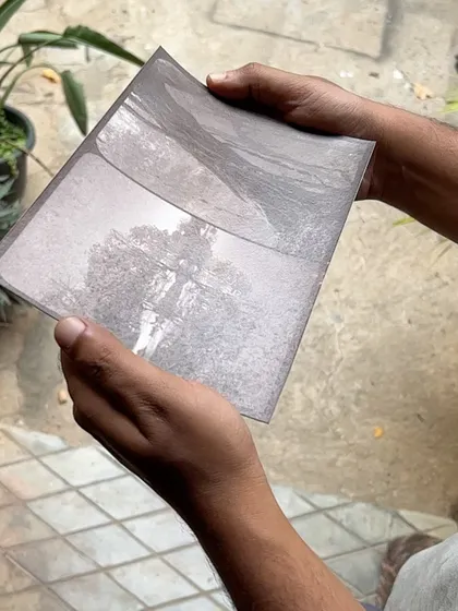 A closer look at a freshly made albumen print. We are constantly experimenting with historical processes to explore new narrative possibilities in our work.