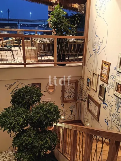 The interior courtyard and staircase at ISSA Goa serve as a visual hub, featuring European-inspired artworks by local artists. This space celebrates Goa's creative spirit and adds a layer of cultural richness to the design.