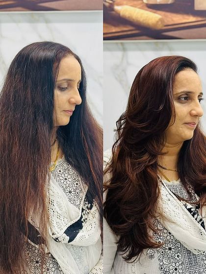A complete hair makeover. We gave her a new reddish-brown color and a layered cut that adds volume and shape.