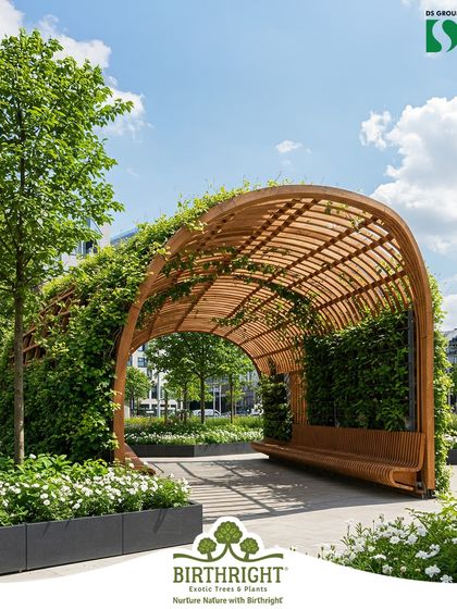 This arched green tunnel creates a beautiful and immersive walkway in an urban park. By covering a simple structure with climbing plants, we've designed a sheltered path that offers a refreshing escape from the city.