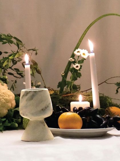 The 'Nari' goblet, with its marbled glaze, adds a touch of modern elegance to the tablescape. It's a beautiful example of our commitment to harmony and uniqueness.