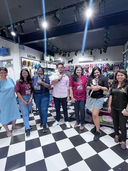 Our team of volunteers and the staff at Heads Up For Tails, all smiles after a successful adoption camp. These events are a massive collaborative effort, and we're so grateful for our partners.