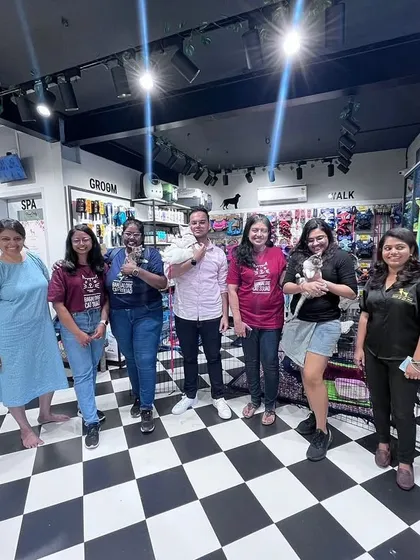 Our team of volunteers and the staff at Heads Up For Tails, celebrating another successful adoption camp. Teamwork makes the dream work!