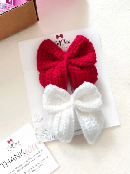 A simple and classic combination of our crochet Sailor Bows in bright red and pure white. These are perfect for any occasion.