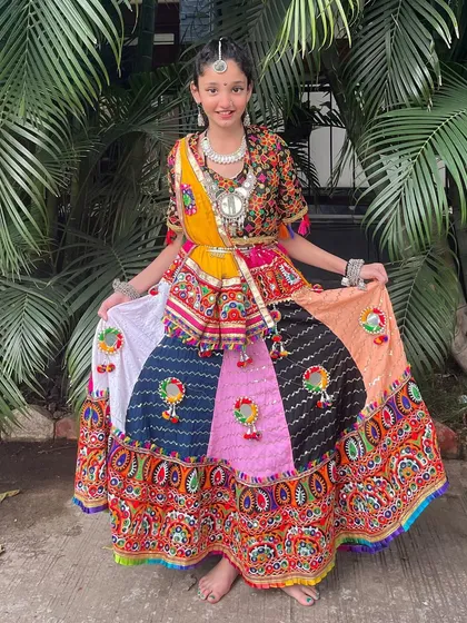 Garba is for everyone, and I make sure the little ones have the best outfits! This adorable multi-colored chaniya choli is designed for kids, ensuring they can dance, play, and celebrate Navratri in full festive style, feeling comfortable and happy.
