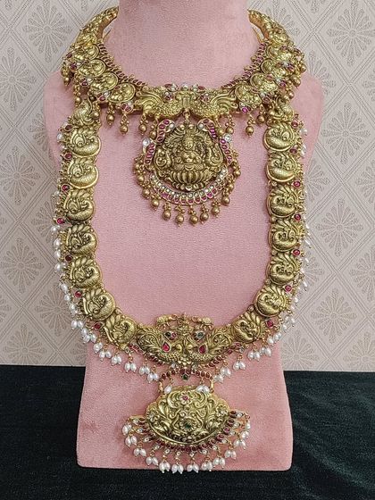 Another new arrival. This antique-finish set has a grand Lakshmi pendant and is perfect for a divine bridal look.