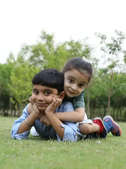 Capturing the unique bond between siblings is one of my favorite things to do. These unposed, playful interactions result in the most authentic and heartwarming photographs.