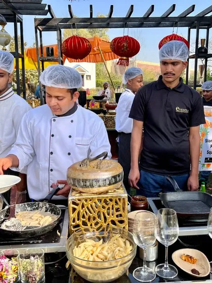 A live pasta station in action at a Holi party. Guests could get their pasta made to order, adding an interactive and personalized touch to the festivities.