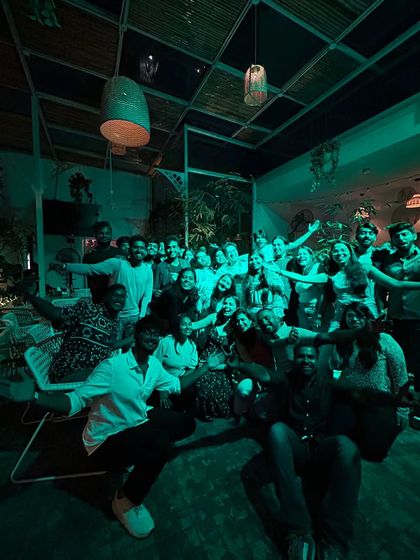 The classic SRK pose. A group photo from our 'Ek Shaam SRK Ke Naam' event, celebrating the Badshah of Bollywood.