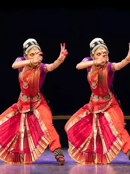 The energy of a group performance is electric. This image captures the 'maja' of playing a gopa, showcasing the synchronized and dynamic movements I choreograph for group productions. Whether for a solo artist or an ensemble, I aim to create a powerful visual narrative.