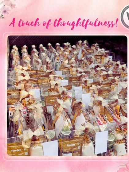 A display of dozens of hampers wrapped and ready for a bulk order. This image demonstrates my capability to handle large volumes with a touch of thoughtfulness, ensuring each gift is perfectly presented.