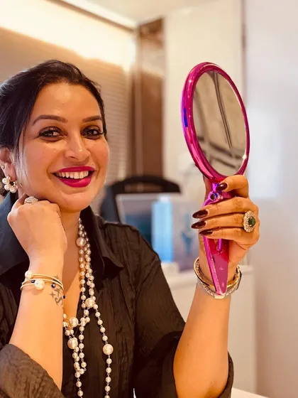 Taking a moment to reflect. The goal is for every client to look in the mirror and love the skin they're in.