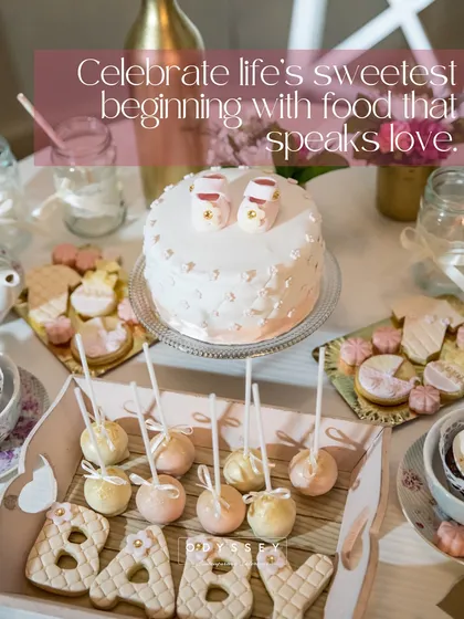 We craft sweet stories for life's most precious moments. This adorable baby shower dessert table features a custom cake with tiny booties, themed cake pops, and "BABY" cookies, all designed to create a heartwarming and delicious celebration.