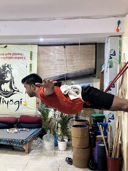 Another view of the suspended plank, showcasing the strength and focus required.