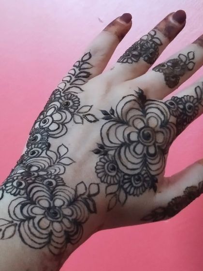 The same bold floral design as the previous image, but with only the linework done. This shows the first step in creating these striking, graphic-style floral patterns.