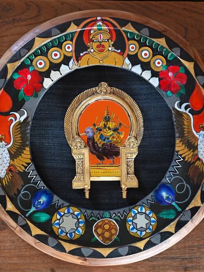 A full, clear shot of the hand-painted Shani frame. The artwork depicts his mount, the vulture, and his connection to Lord Vishnu's Kurma avatar through the tortoise motif, all within a restored vintage clock frame.