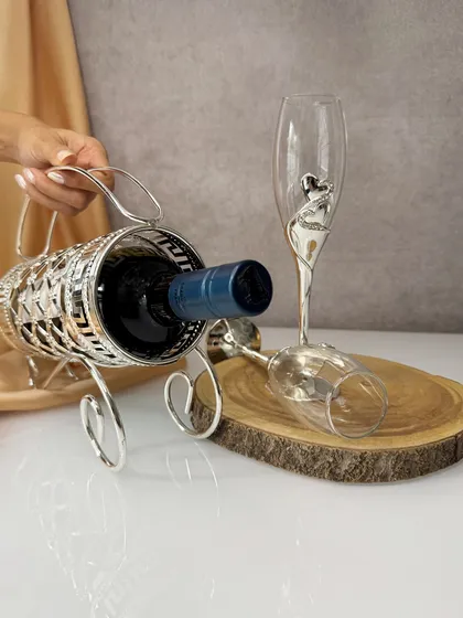 Another view of the wine holder, showcasing how it cradles the bottle. It is a perfect blend of functionality and charm, designed to elevate your hosting.