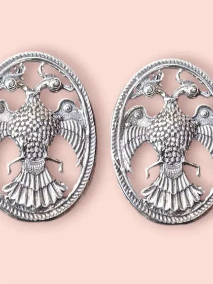 Nothing is more worthwhile than buying pure silver earrings. This pair features a powerful double-headed eagle motif, a symbol of strength and heritage, crafted with intricate detail in 925 sterling silver.