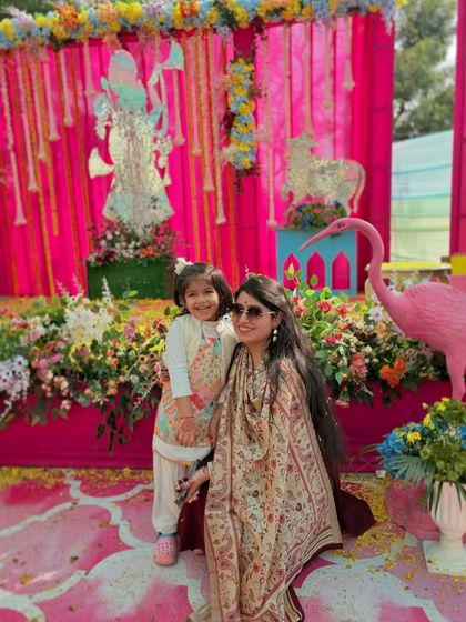 A precious moment with a little princess at a vibrant Mehendi event. I create family-friendly choreography that allows everyone, no matter their age, to share the stage.