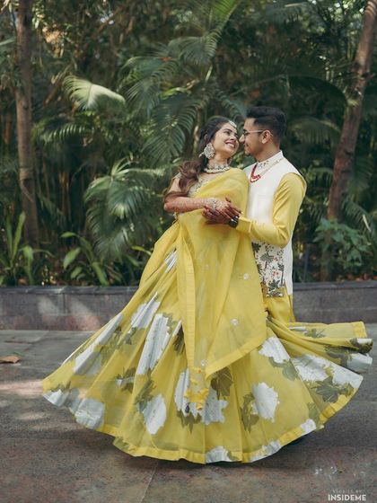 A beautiful couple portrait from the Haldi ceremony. The makeup is designed to look fresh and natural, perfect for daytime events and outdoor photography.