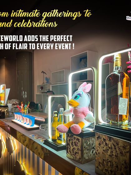 A full view of a themed bar setup, featuring custom bottle displays and playful decor. We handle every detail, from the structure itself to the small touches that bring your theme to life.