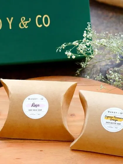 The beautifully packaged Rose and Turmeric Orange soaps from the 'Radiant Diwali Treasures' box.