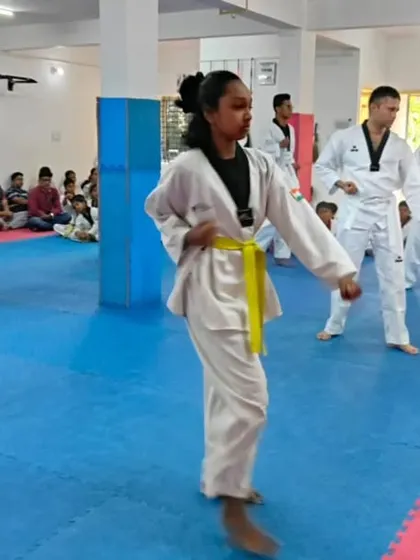Students practicing their forms during a belt exam.