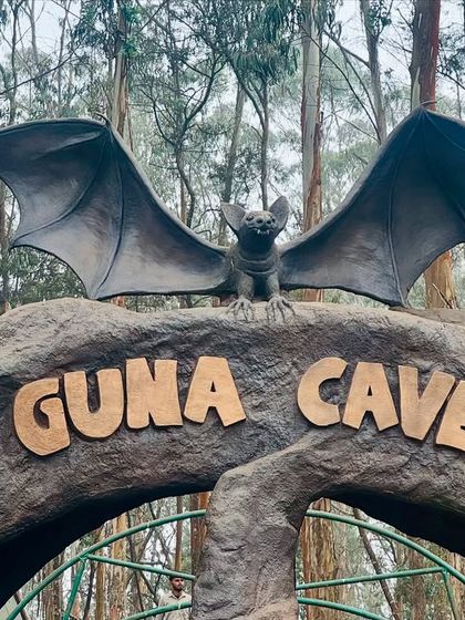 A close-up of the iconic Guna Cave entrance sign, a spot made famous by the movie Manjummel Boys.