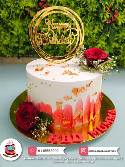 An elegant birthday cake for Mumma, decorated with fresh red roses and gold leaf. The red brushstroke effect adds a modern artistic touch.