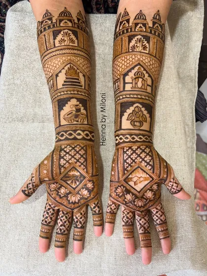 For the first bride of the season, we did a beautiful design featuring temple and kalash motifs. This is a great example of incorporating spiritual symbols into bridal henna art.