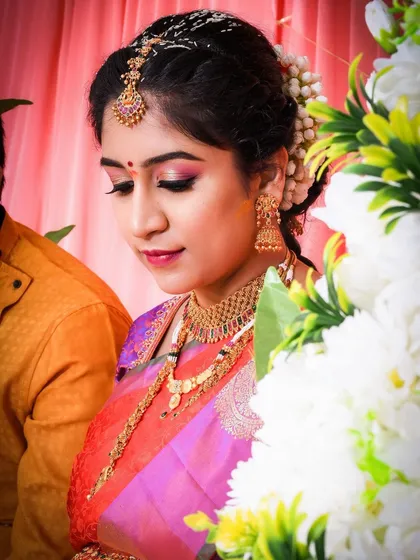 A close up of the baby shower makeup. I used soft pink and gold tones on the eyes to complement her colorful saree, along with my signature winged liner.