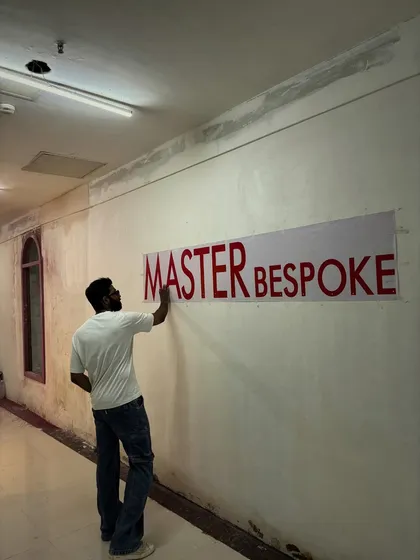 The journey begins. Here I am putting up the first sign for the new Master Bespoke store, a very exciting moment in bringing this dream to life.