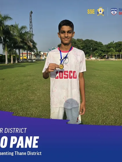 Rio Pane, holding his medal while representing Thane District. His success at the district level is another step on his promising football journey.