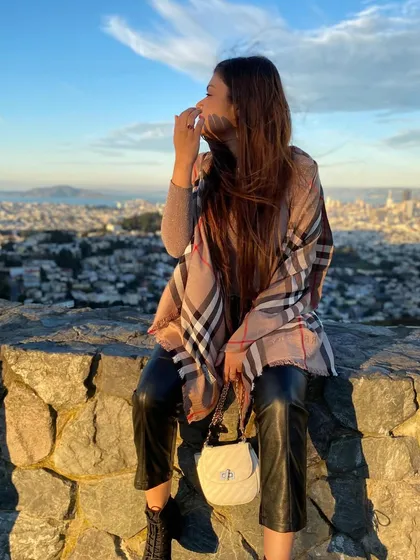 Golden hour at Twin Peaks, San Francisco. This shot captures the breathtaking view of the city skyline, a perfect moment of travel magic.
