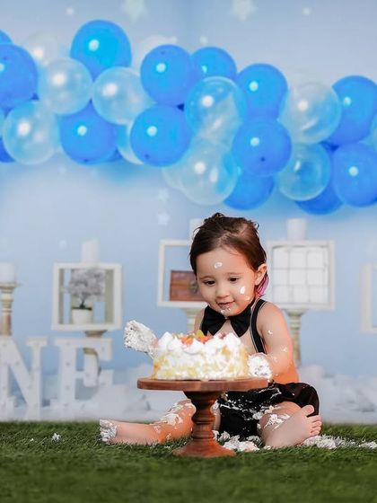 We made a wish and you came true. A classic blue and white themed cake smash in our studio for a very special first birthday.