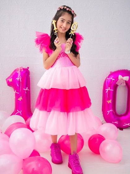 Ten years of fabulous! This portrait captures the personality and style of a confident 10-year-old, celebrating her special day.