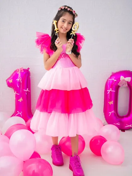 Ten years of fabulous! This portrait captures the personality and style of a confident 10-year-old, celebrating her special day.