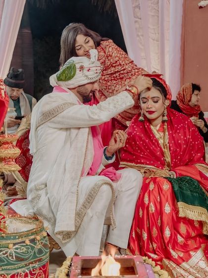 A traditional moment from our Hindu wedding ceremony, as my husband applies the sindoor. This symbolized the official start of our journey as husband and wife.