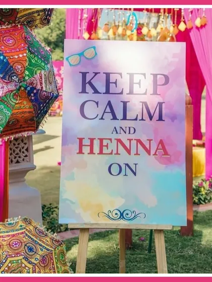 A fun sign at the Mehendi stall during the Rajasthani mela, reminding guests to "Keep Calm and Henna On."