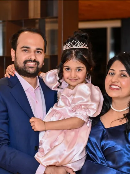A lovely family portrait with the birthday girl looking like a princess in her tiara.