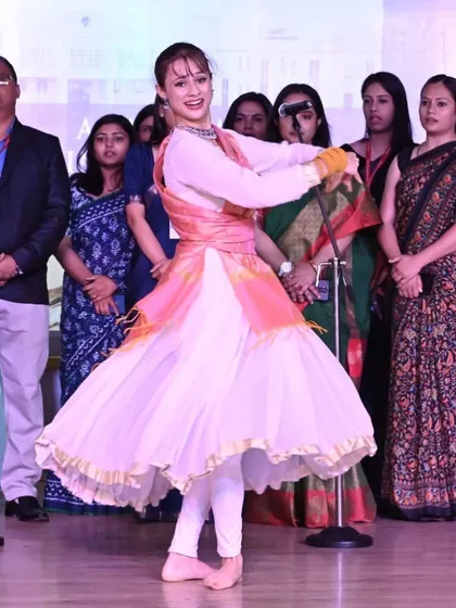 A moment of pure joy captured during a stage performance. The twirl is one of the most beautiful expressions in Indian dance forms.