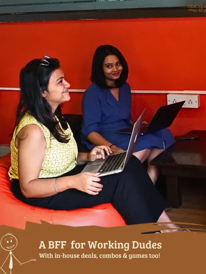 Bring your work bestie and find a comfortable spot. Here, two colleagues work together on our bean bags, showing that productivity doesn't have to mean sitting at a formal desk.