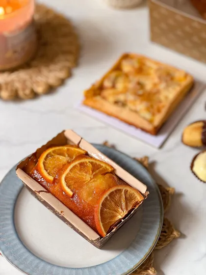 A close-up of the candied orange tea cake, a moist and flavorful bake included in the Father's Day brunch box.